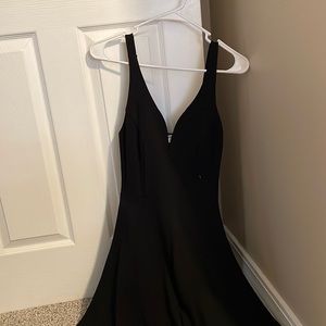 Black mini dress with sweetheart neck line